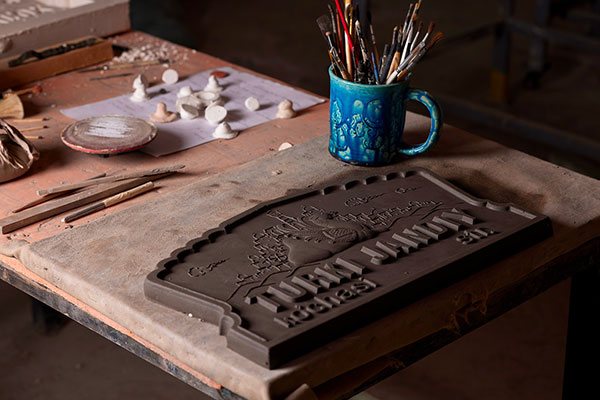 Workbench with ceramic relief