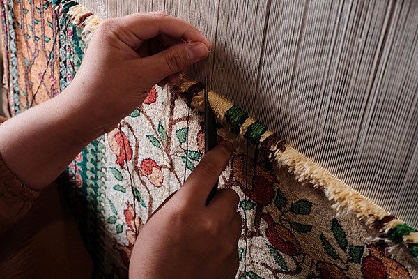 Hands at the loom